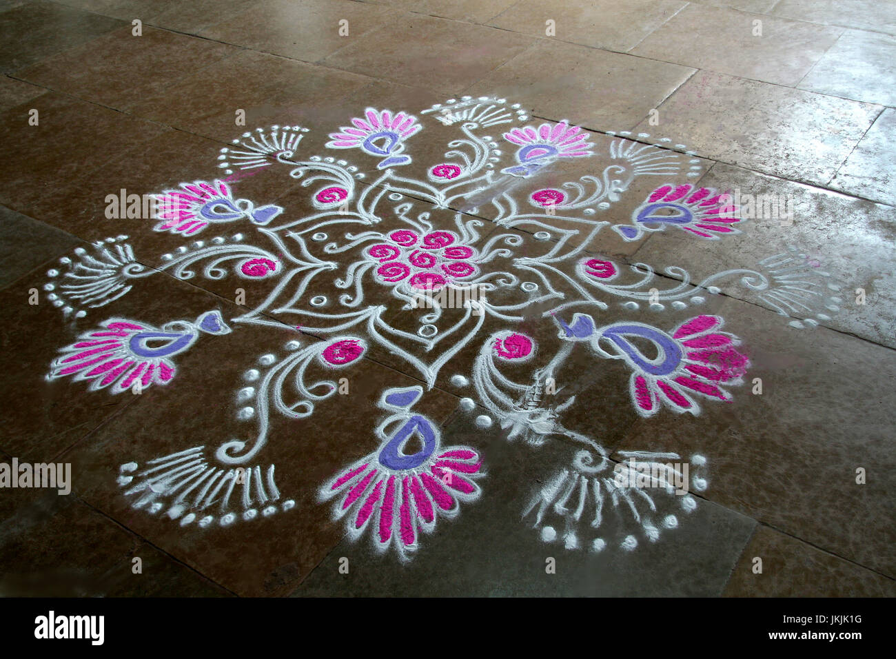 Skillful rangoli handiwork design using coloured stone powder Stock ...