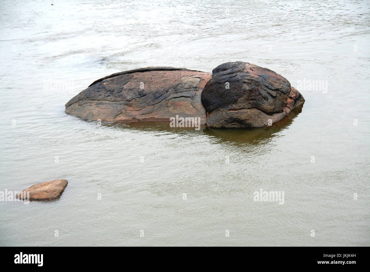 Rocks shaped like submerged elephant in the middle of Tungabhadra River ...