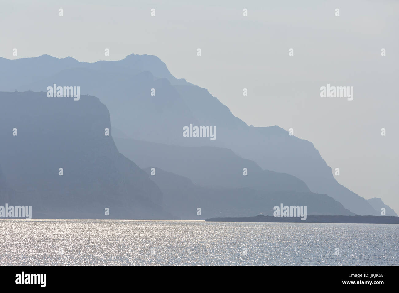 Silhouette of seacliffs on the coast of Euboea island in Greece. Stock Photo