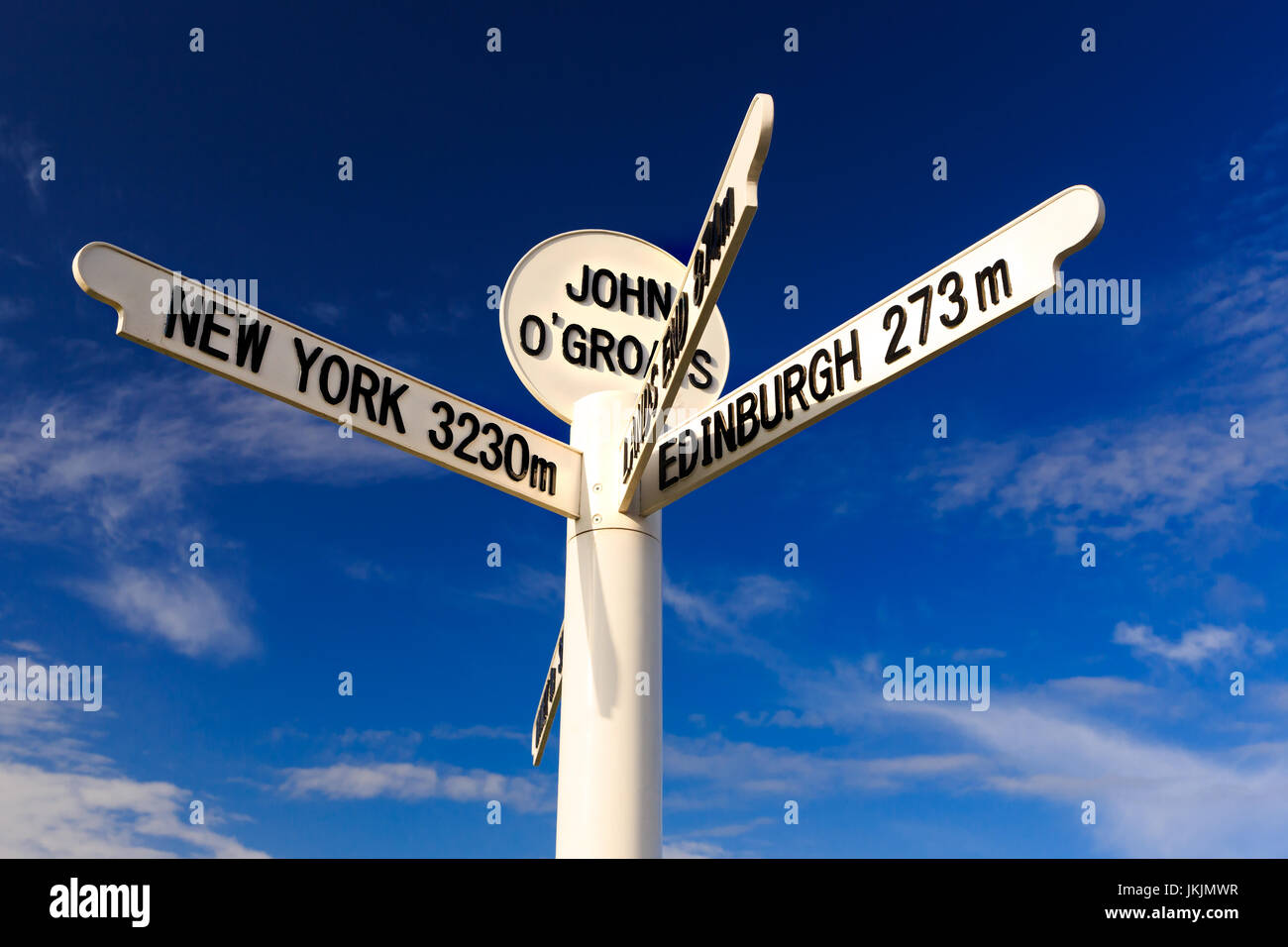 signpost at John O'Groats, most northern point of UK mainland, port for pedestrian ferry to Orkney Island Stock Photo