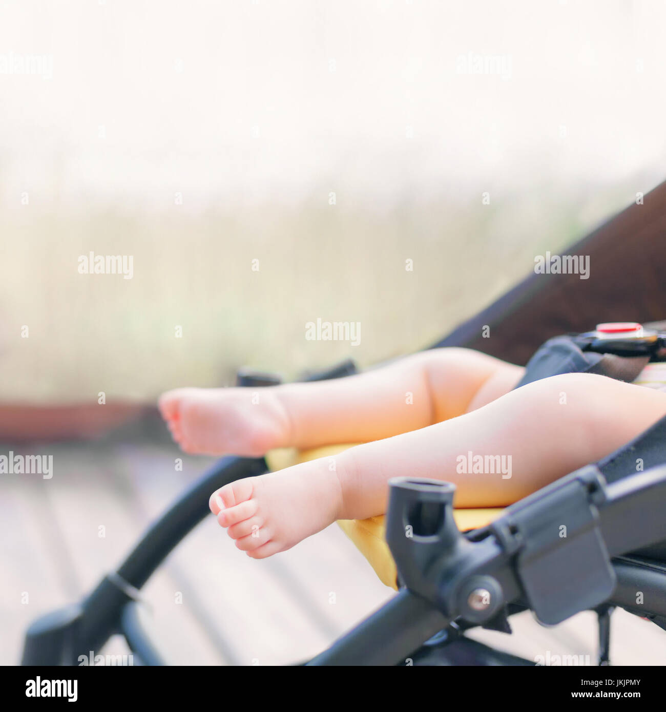 Newborn baby sleeping in stroller outdoors Stock Photo Alamy