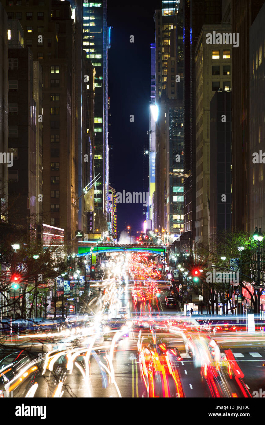 Long Exposure View Down East 42nd Street At Night With Park Avenue Viaduct, Pershing Square Plaza And Grand Central Terminal, New York Stock Photo