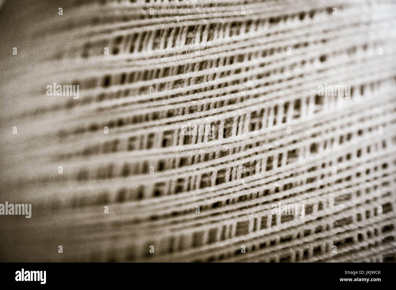 De-coiled beige thread clew macro background whute Stock Photo - Alamy