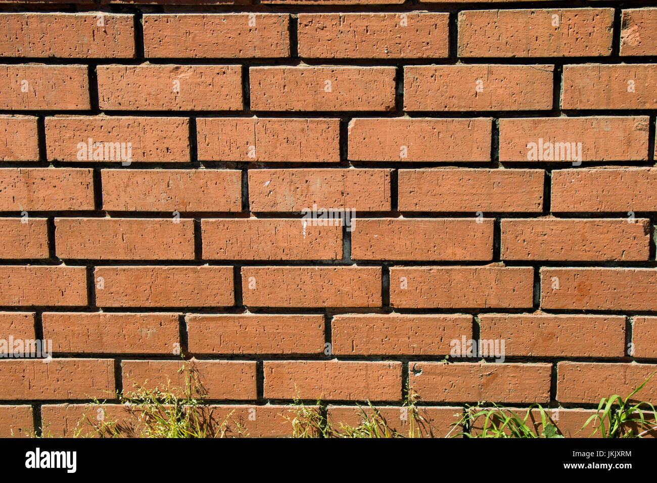 Old grunge brick wall as a background Stock Photo - Alamy