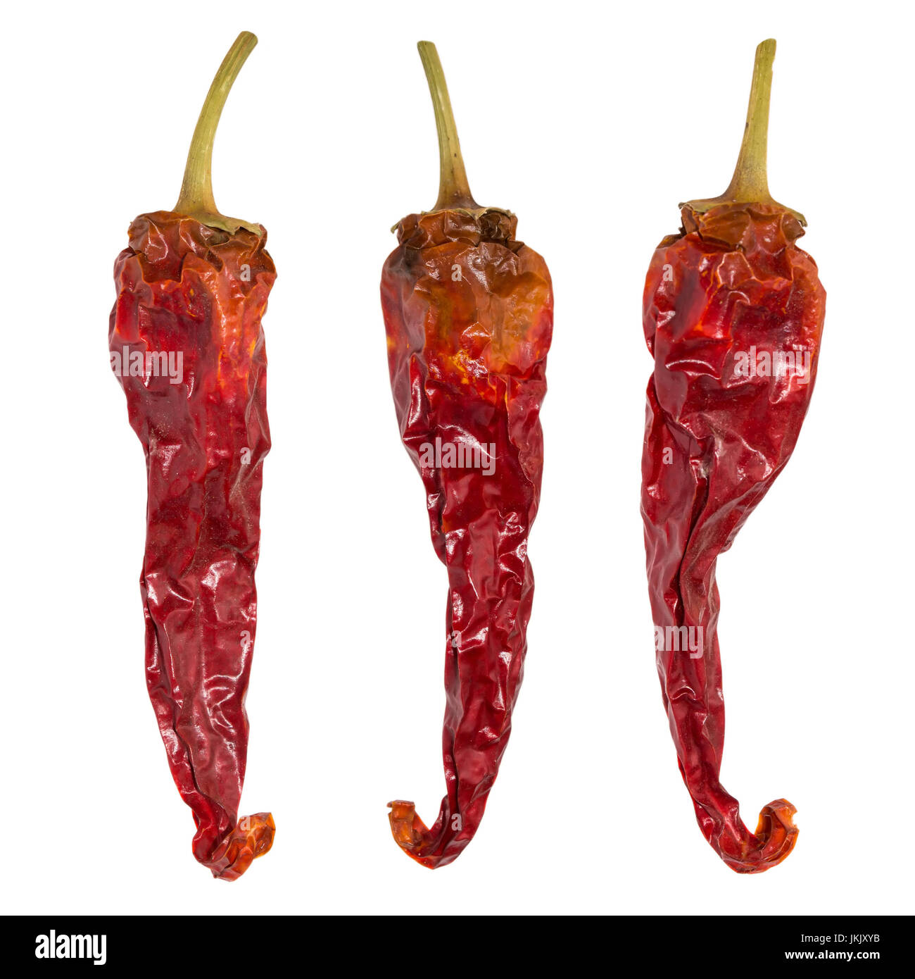 Dry chili pepper isolated. Dried vegetable. Group of peppers Stock