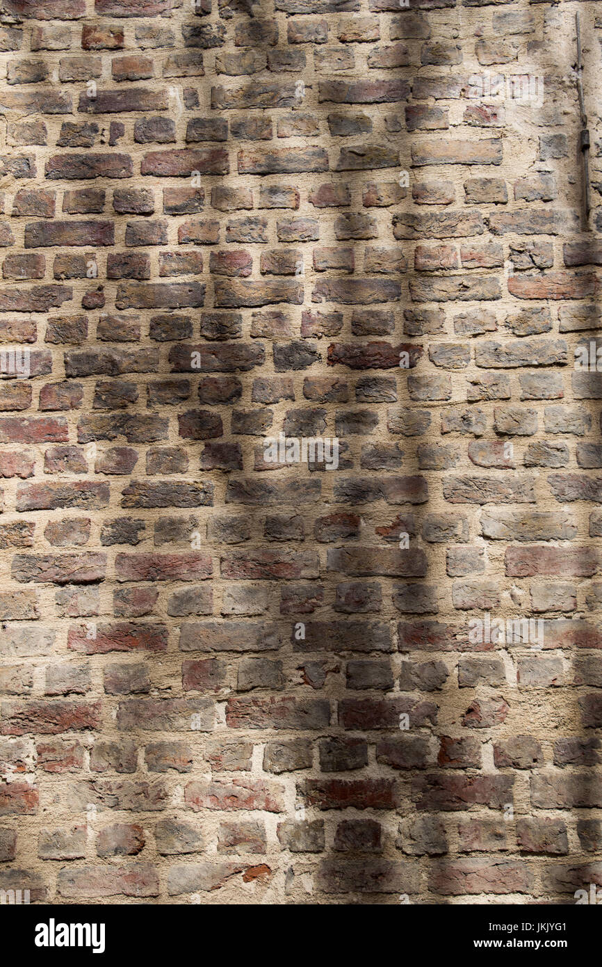 Old grunge brick wall as a background Stock Photo - Alamy