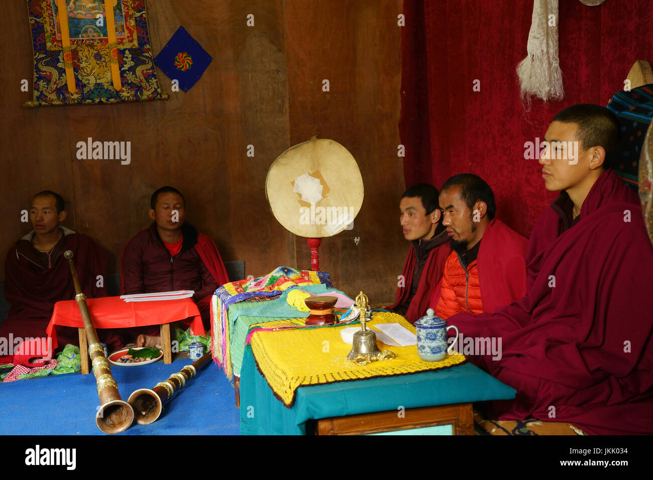 Bhuddist monks during prayer session at Phobjikha elemntary school, Phobjikha valley, Bhutan Stock Photo