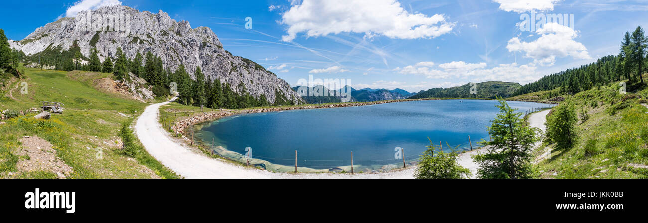 Lake in summer near mountain Gartnerkofel on Nassfeld in Carnic Alps in Austria Stock Photo