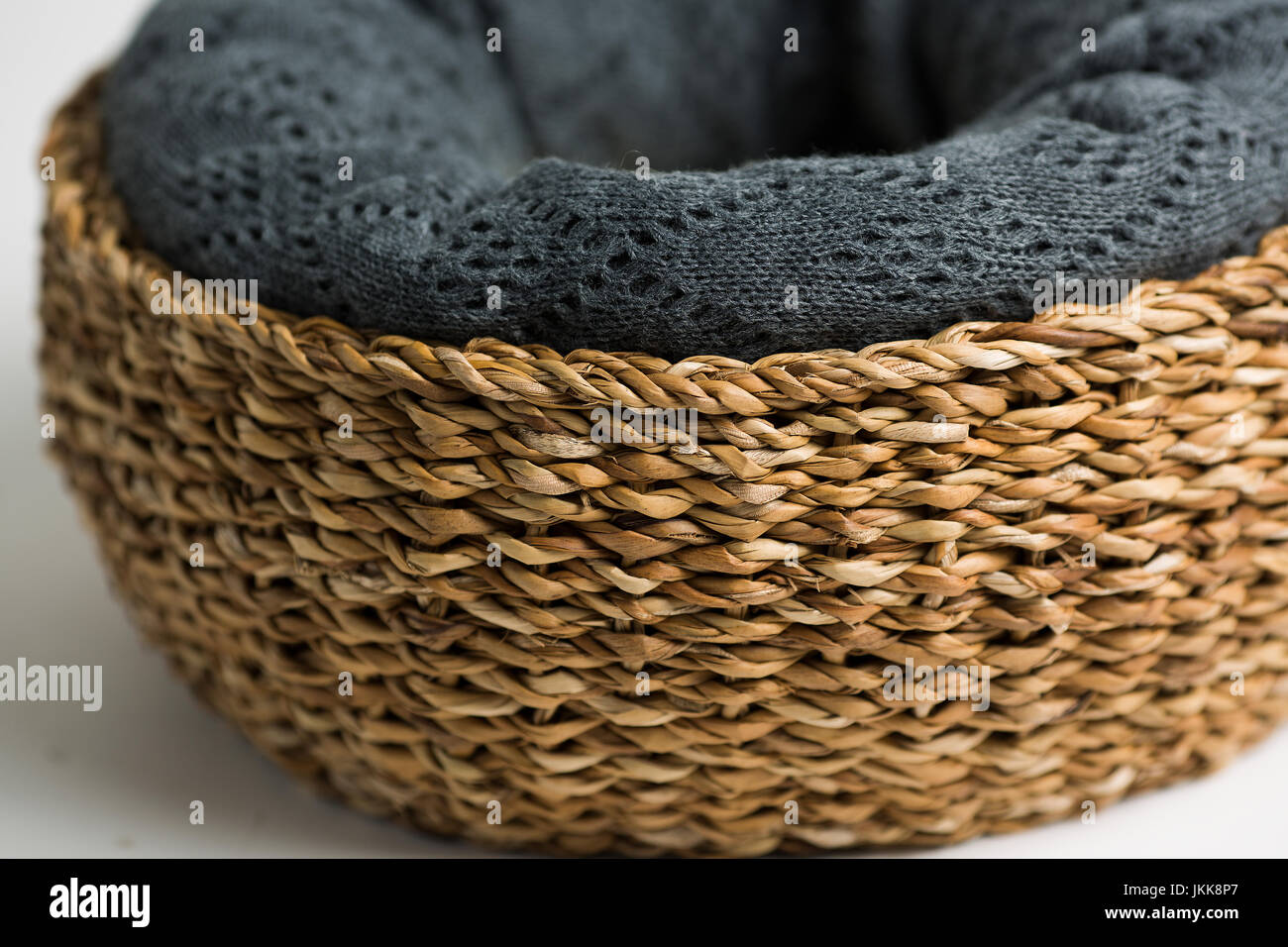 Empty wicker basket isolated on white Stock Photo
