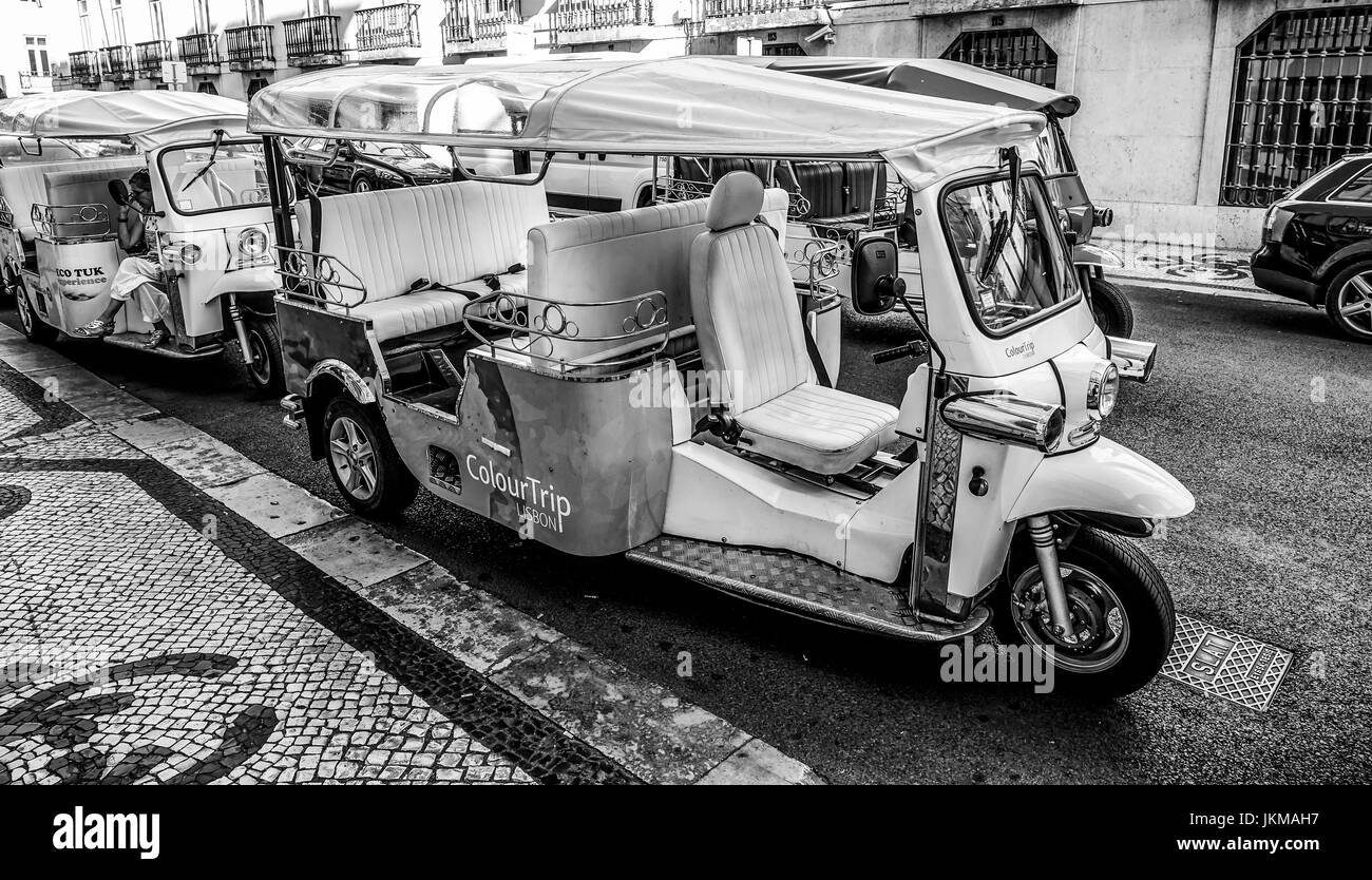 Famous Tuk Tuk Cars in the city of Lisbon - Lisbon 2017 Stock Photo