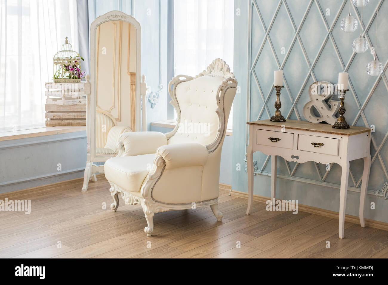 luxury armchair in a plain white interior Stock Photo - Alamy