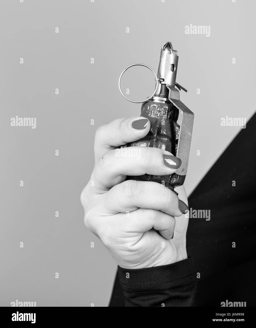 Close-up of hand holds a grenade Stock Photo