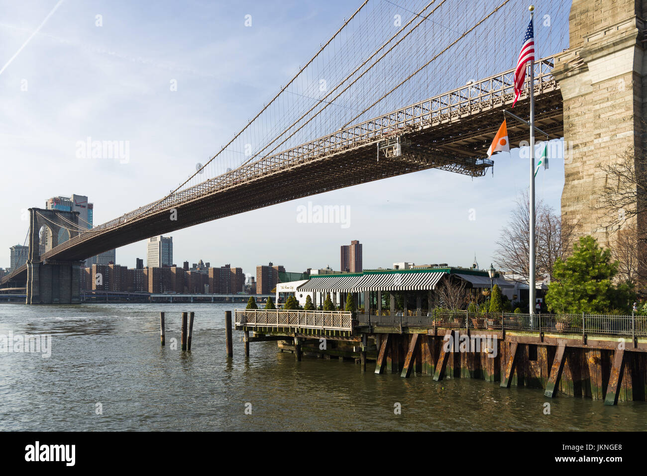 Brooklyn Bridge With The River Cafe Restaurant Underneath, New York, USA Stock Photo