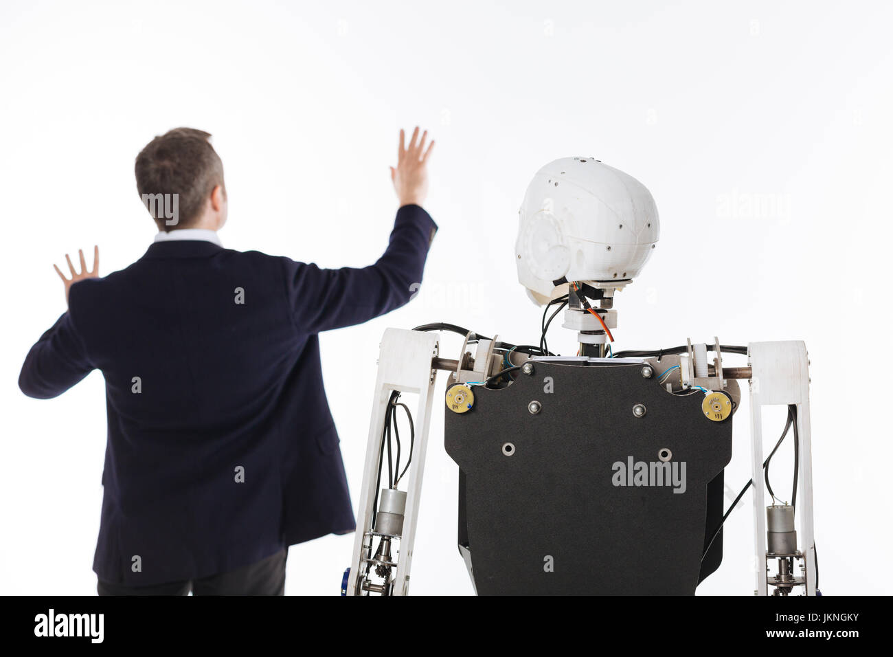 Imaginative brilliant man employing innovative technologies Stock Photo