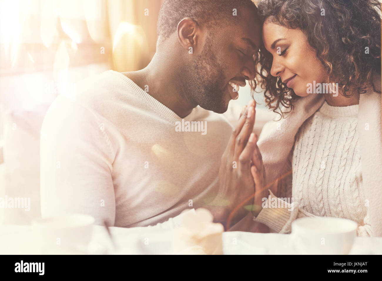 Happy delighted couple enjoying being together Stock Photo