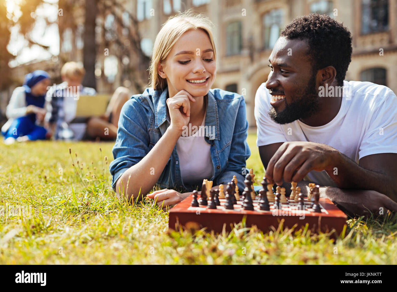 friends playing chess, Stock image