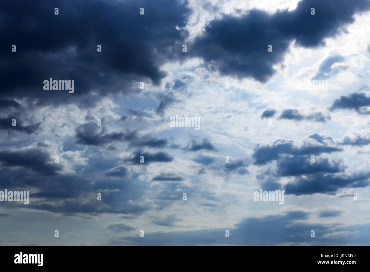 A blue sky with storm clouds. Before the rain Stock Photo - Alamy