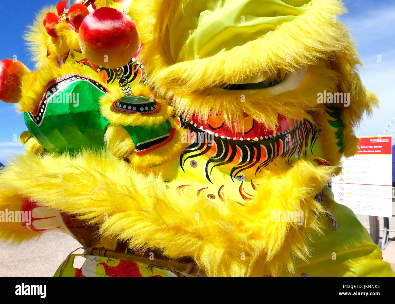 Blackpool, UK. 23rd July, 2017. Blackpool's First international carnival: Todays first international carnival takes place in the seaside town under glorious summer sunshine on the Promenade between Central and South piers. A colourful dragon from the Liverpool Chinese community.Credit: Kev Walsh/Alamy live news Stock Photo