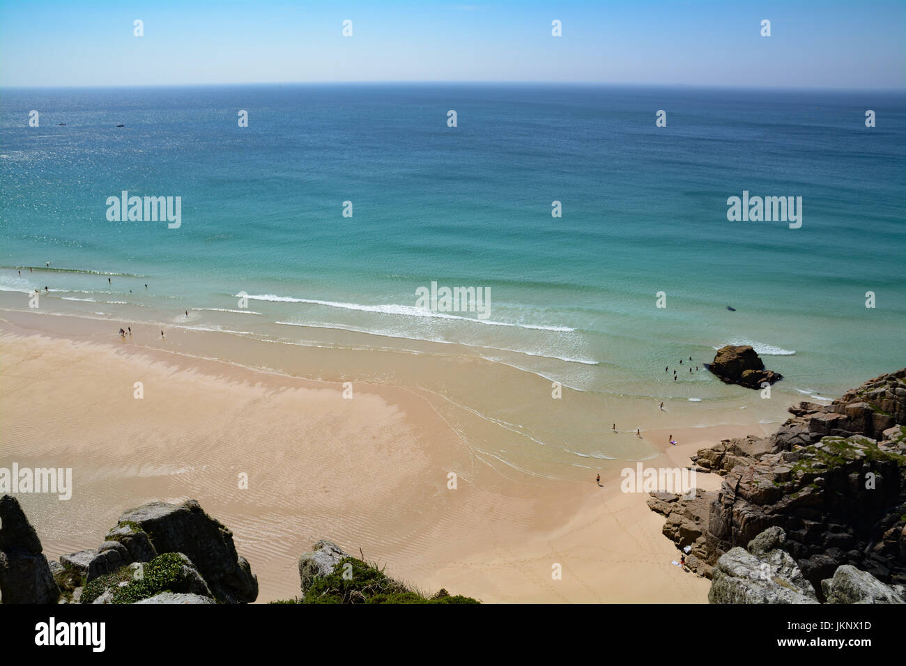 Treen, Cornwall, UK. 24th July 2017. UK Weather. With monday looking to be the best day of the week, tourists made their way down to the turquoise waters at Treen Beach, with many German holiday makers amongst them. Credit: cwallpix/Alamy Live News Stock Photo