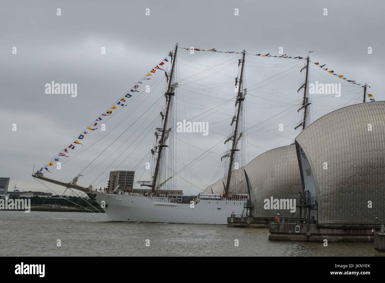 London, UK  24th July 2017. 115 metre long Peruvian Navy training ship, BAP Union, Passes through the Thames Barrier heading towards West India Dock,Canary Wharf where it will be open to the general public to climb aboard between 25th til 29th July.Like other similar ships, Unión has been conceived not only for training purposes, but also to be a sailing ambassador for its home country. Due to its features and dimensions, it has been considered (as of the date it was commissioned) the largest sail vessel in Latin America. Credit: claire doherty/Alamy Live News Stock Photo