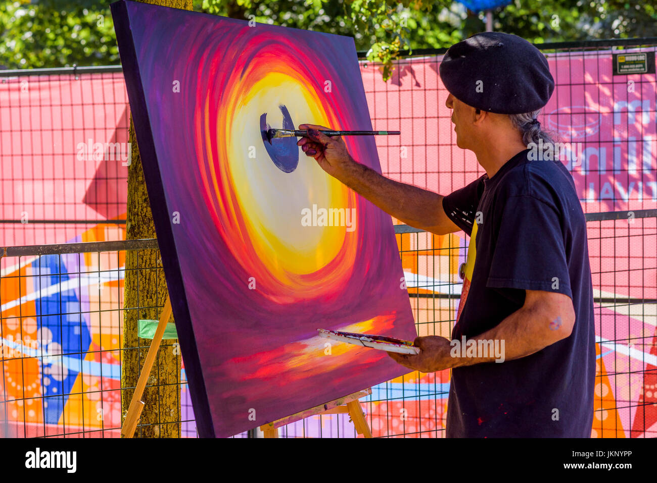 Vancouver, Canada. 23rd July, 2017. Artist painting in situ, the Drum