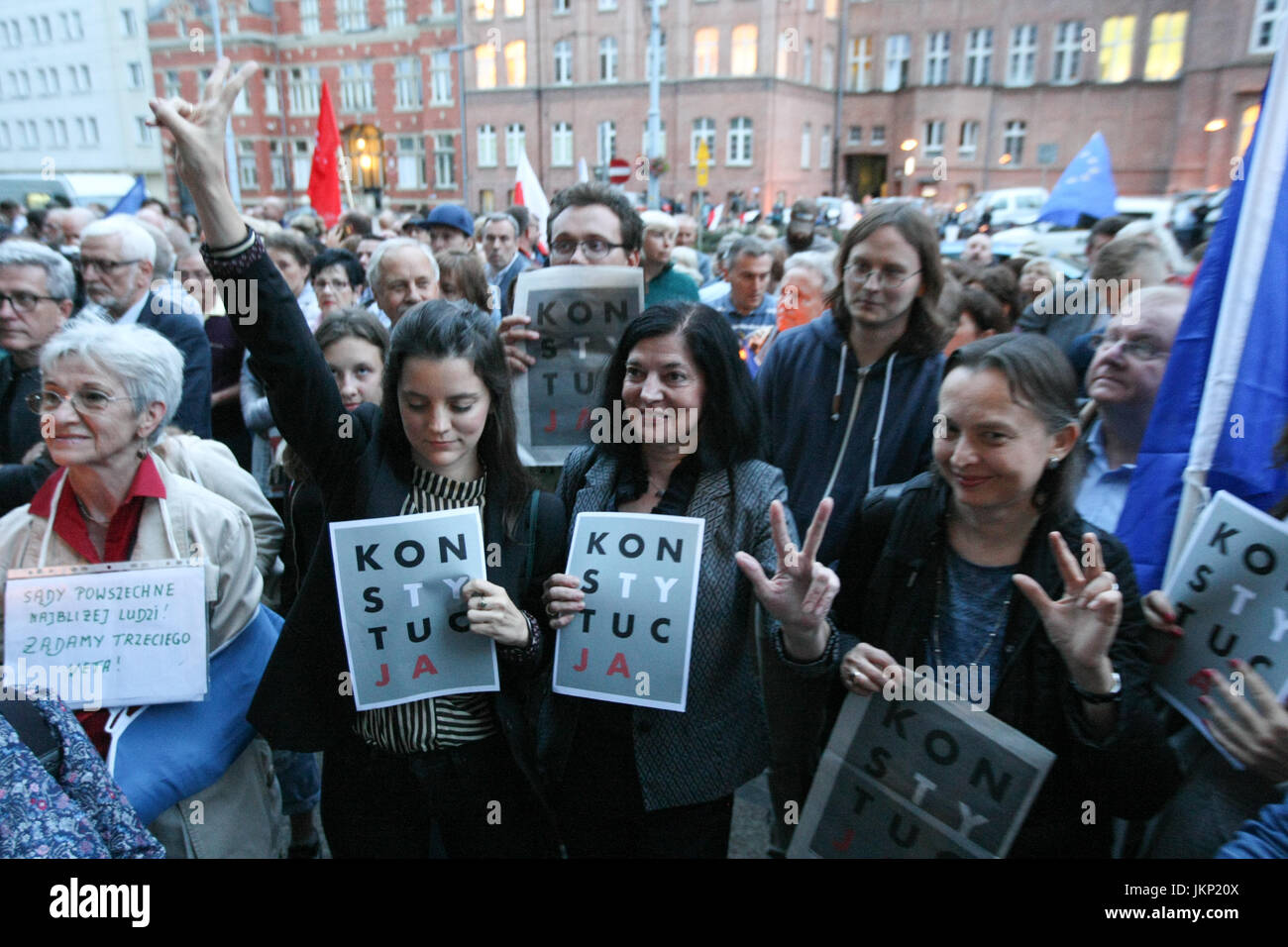 Gdansk, Poland. 24th July, 2017. Protesters in front of Gdansk Regional Court are seen in Gdansk, Poland on 24 July 2017  Crowds gathered outside the Regional Court and other cities around the country to protest at government plans fof changes to Poland’s judicial system despite to Presidential veto on two of three controversial legal changes. Protesters argued the changes would limit judicial independence and threaten the separation of powers in the country. Credit: Michal Fludra/Alamy Live News Stock Photo