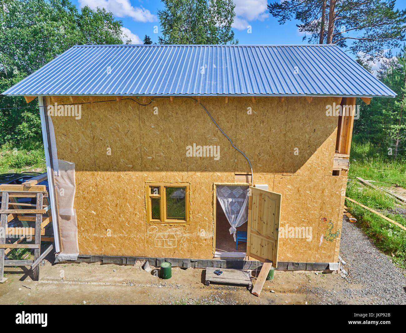 Construction of a frame house Stock Photo - Alamy
