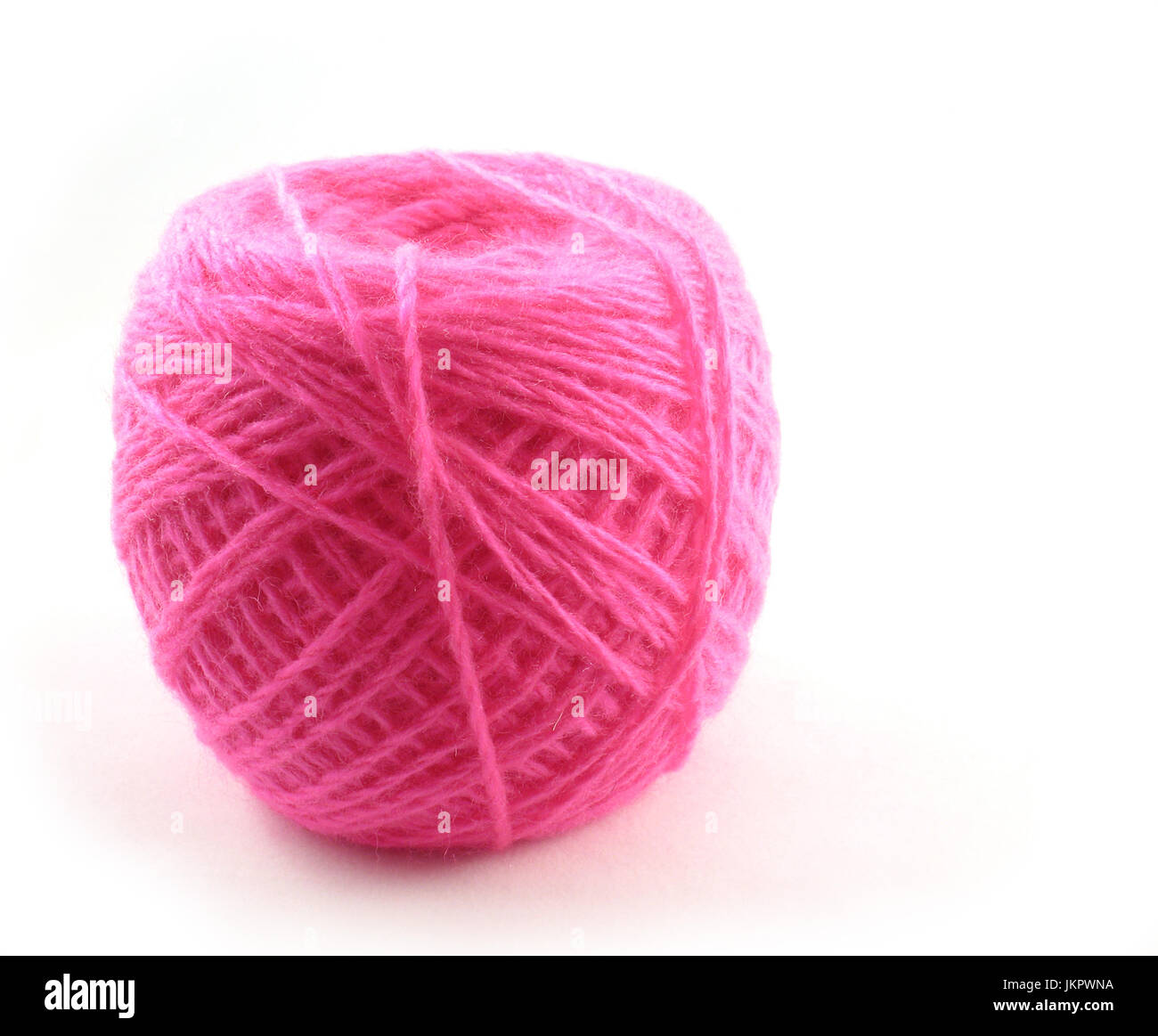 Ball of pink threads for knitting. It is isolated on a white background ...