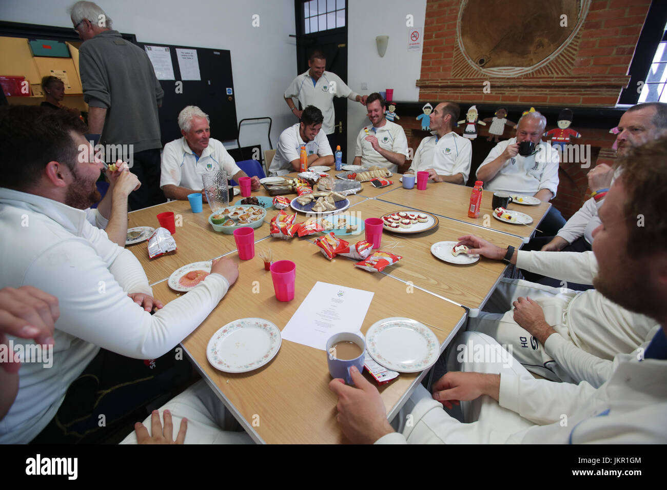 Members of Tilford Cricket Club taking lunch during their village
