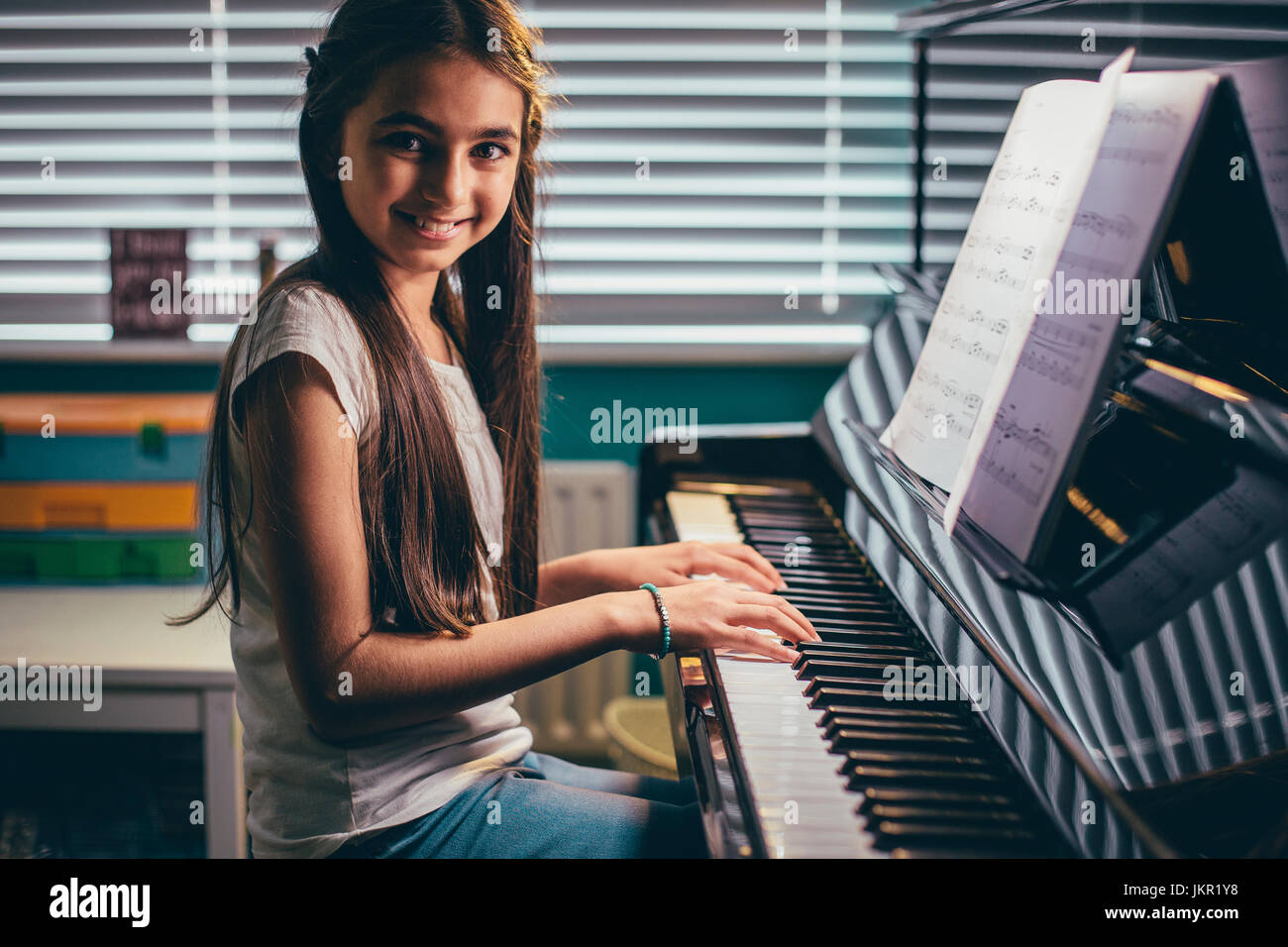 She plays piano hi-res stock photography and images - Alamy