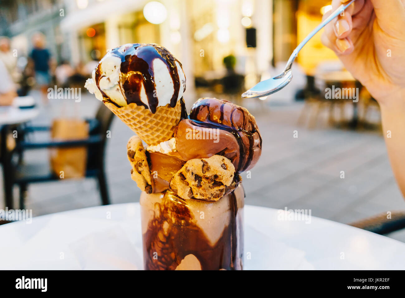 Delicious Ice Cream Eating At Restaurant Stock Photo
