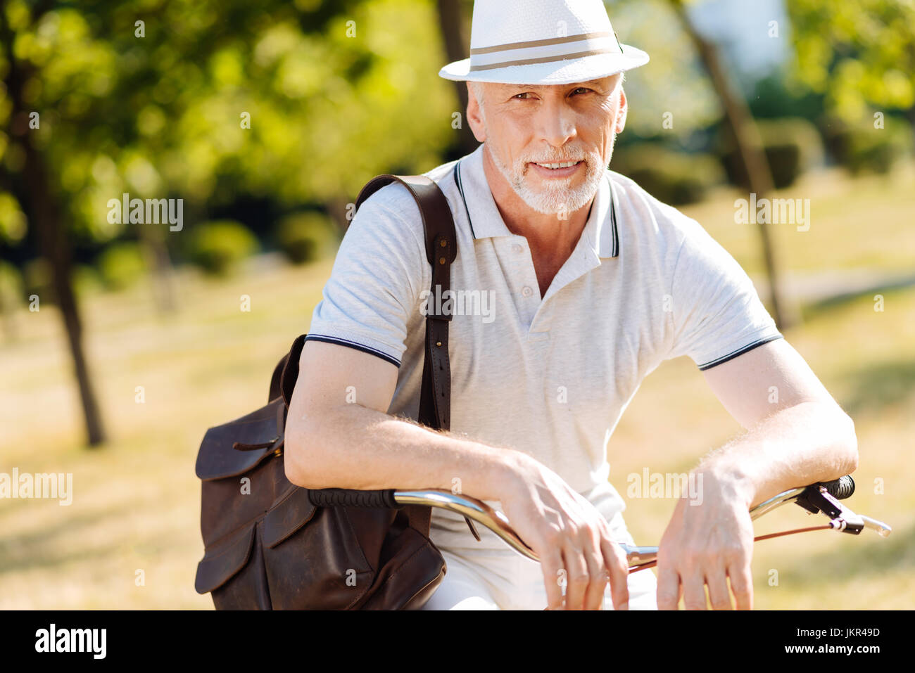 Portrait of thoughtful retirement that dreaming about vacation Stock Photo