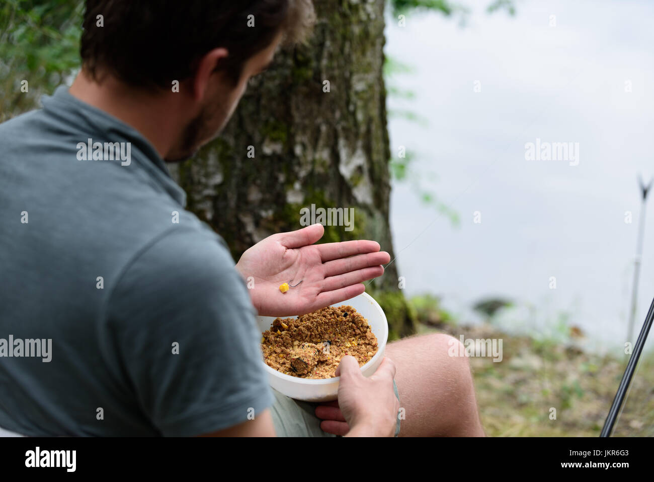 Hand holding lure hi-res stock photography and images - Alamy