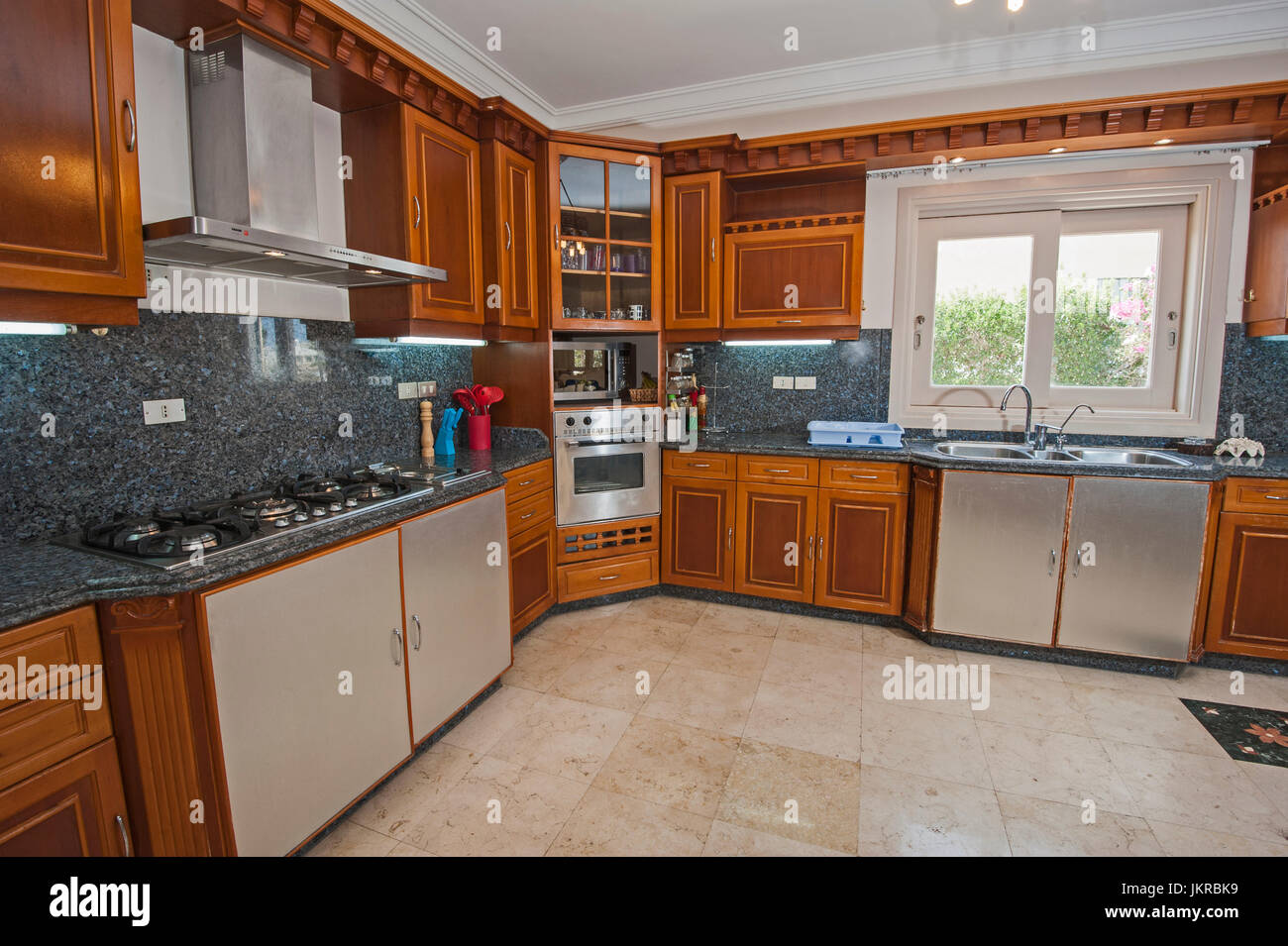 Kitchen and dining area in luxury apartment show home showing interior ...
