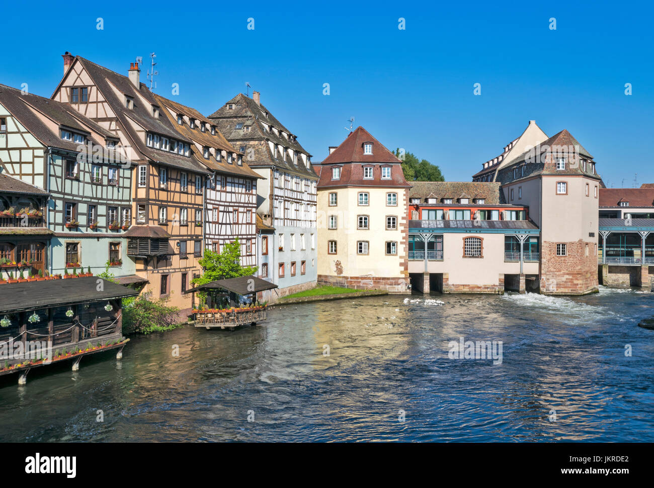 STRASBOURG THE PETITE FRANCE DISTRICT AND RIVER L'ILL THE  PONT ST MARTIN AREA WATERFRONT PASTEL COLOURED OLD HOUSES Stock Photo