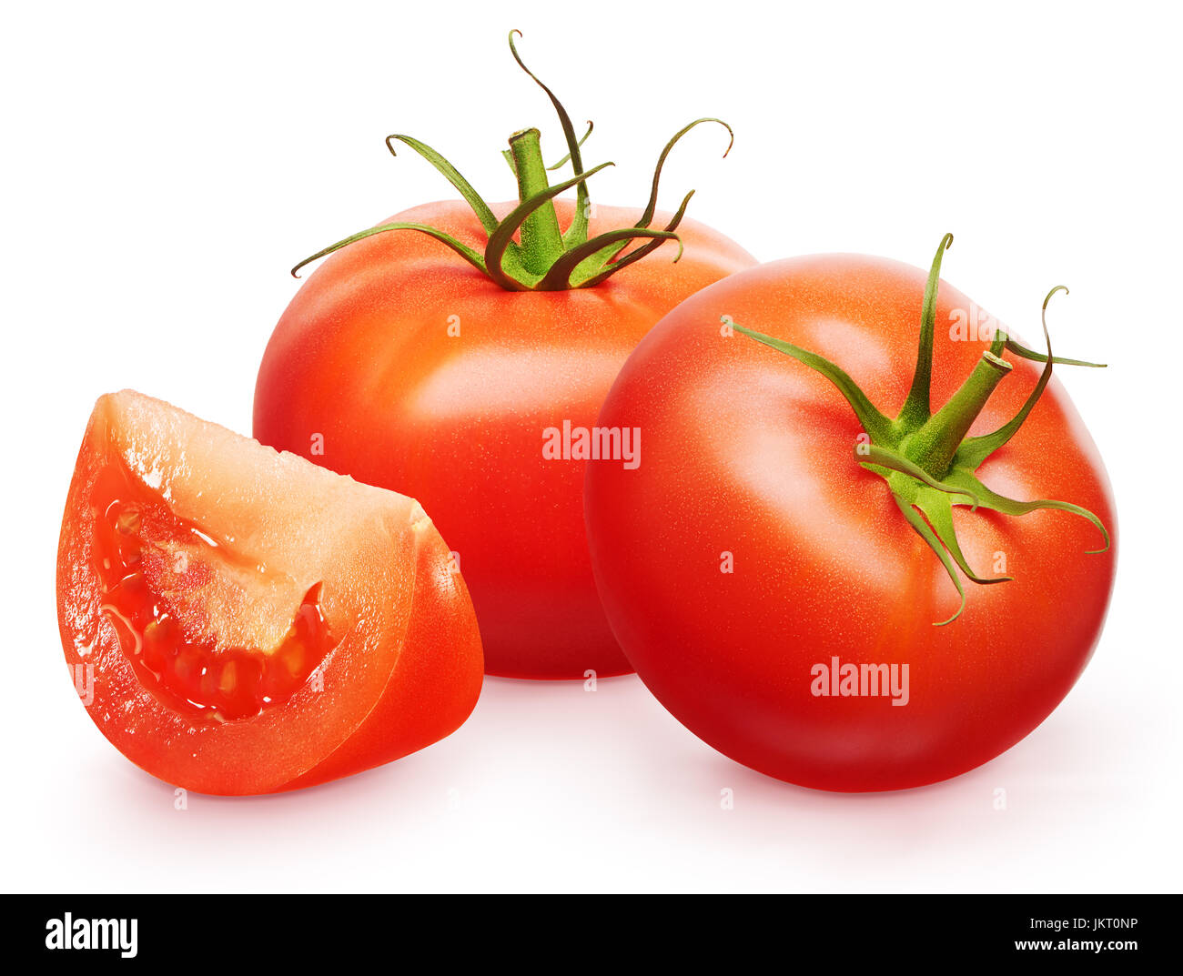 Two whole fresh red tomatoes with green leaves and slice isolated on ...