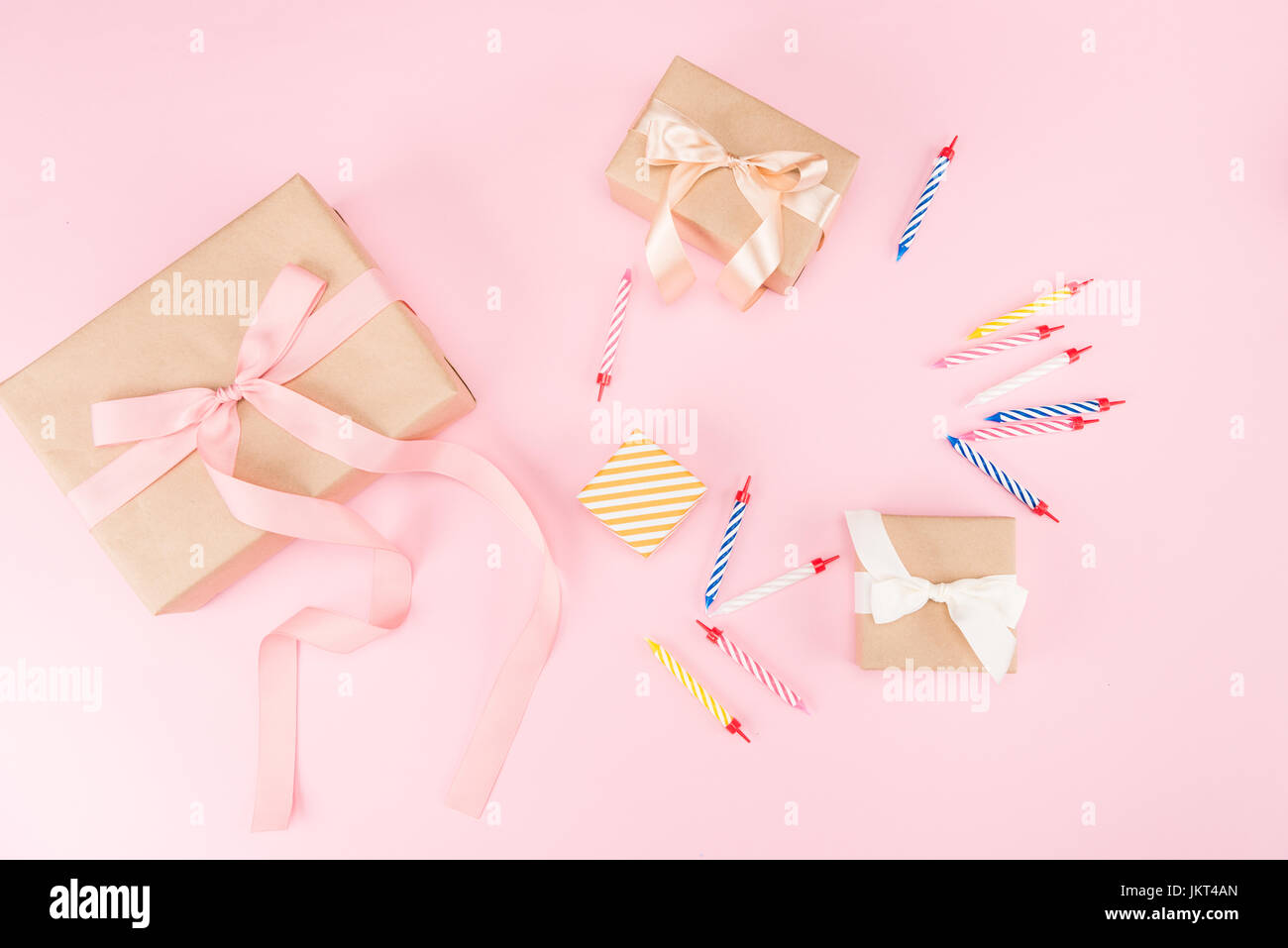 top view of candles with gift boxes and confetti mockup, birthday