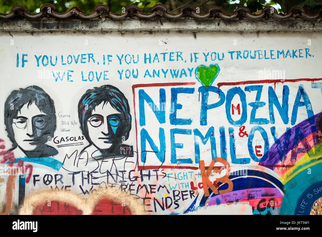Prague, Czech Republic- July 15, 2017: The John Lennon Wall in 1980's was a symbol of resistance against comunist government, but today it is covered  Stock Photo