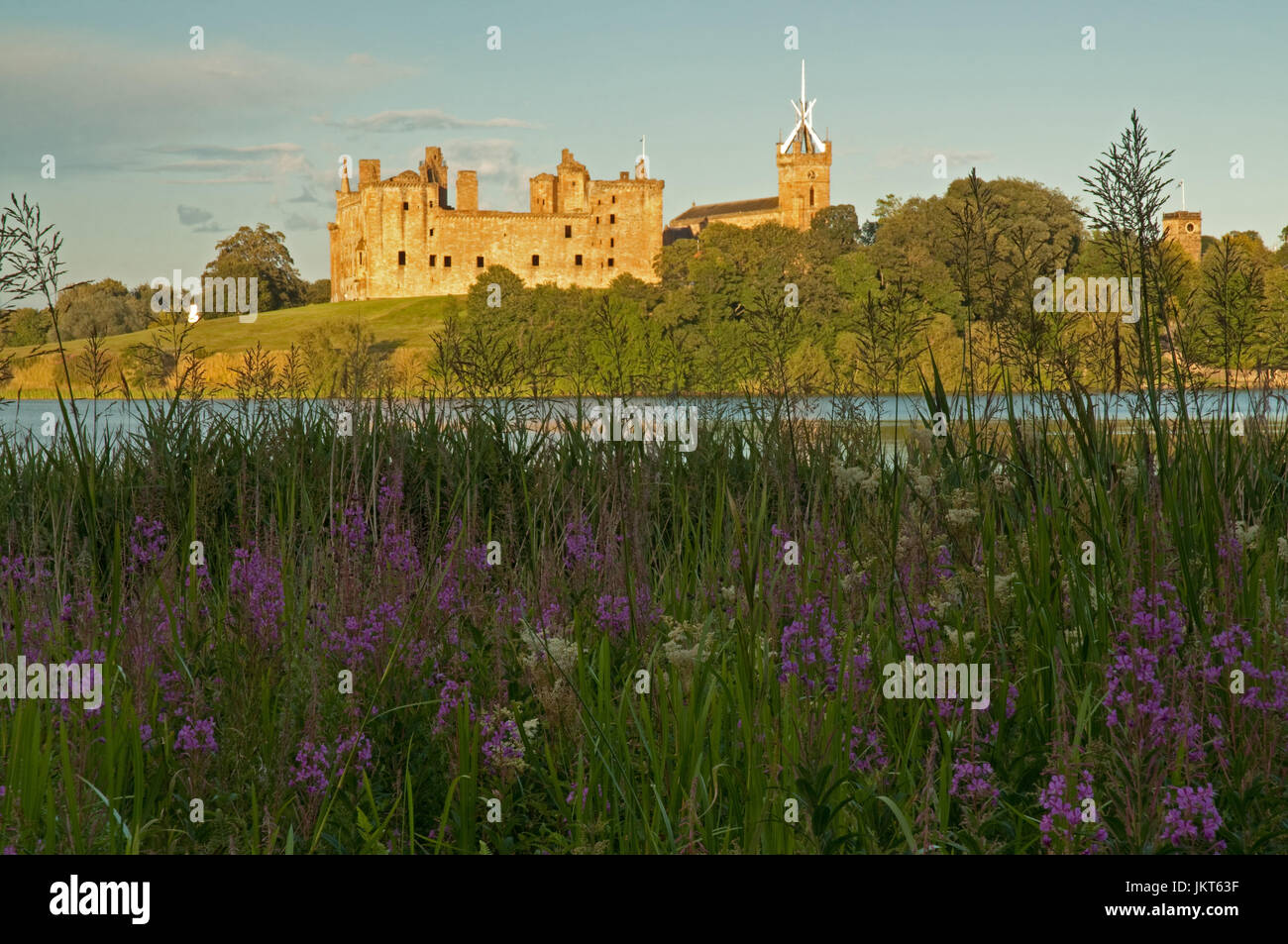 Evening sunlight over Linlithgow Loch and Palace Stock Photo