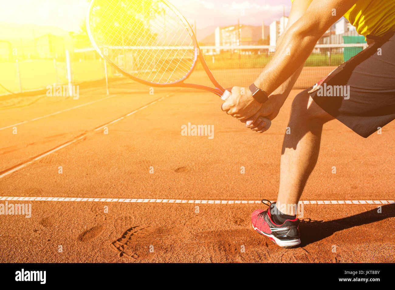 Close up tennis racket hitting the ball hires stock photography and