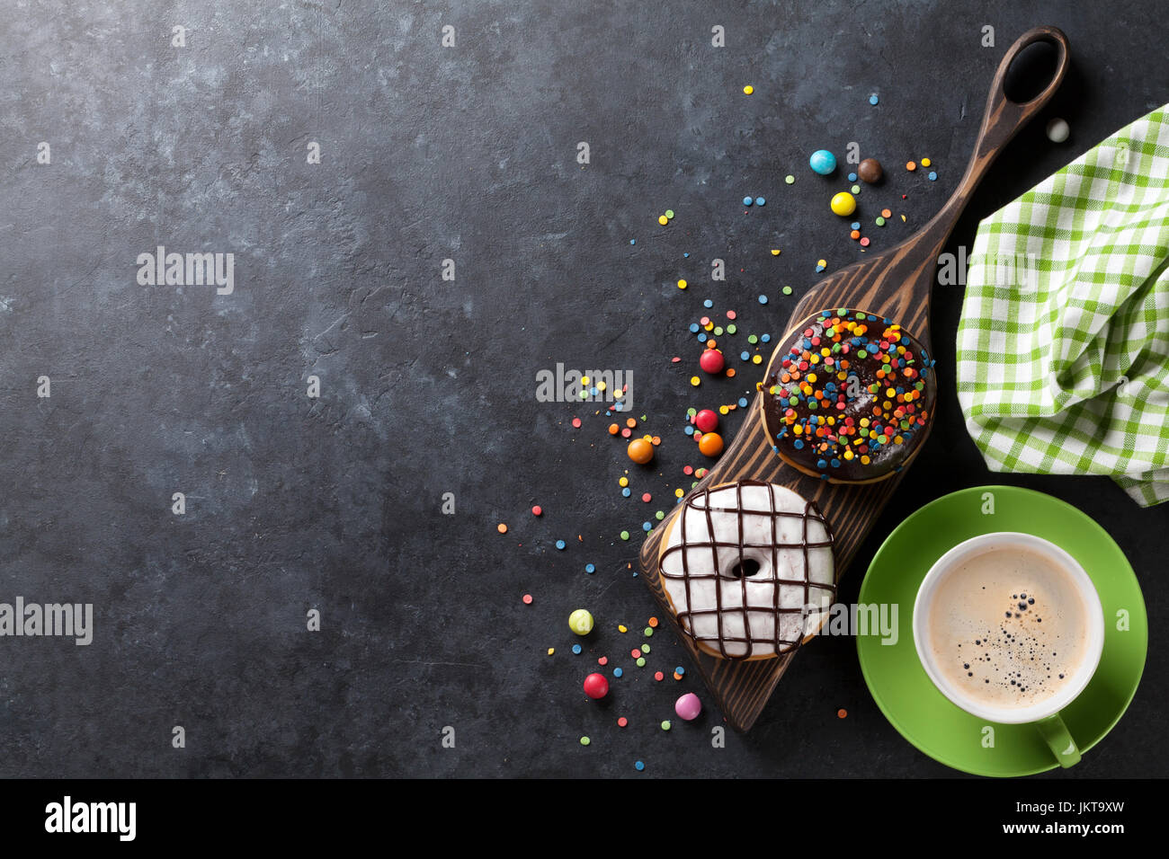 Donuts and coffee on stone table. Top view with copy space Stock Photo ...