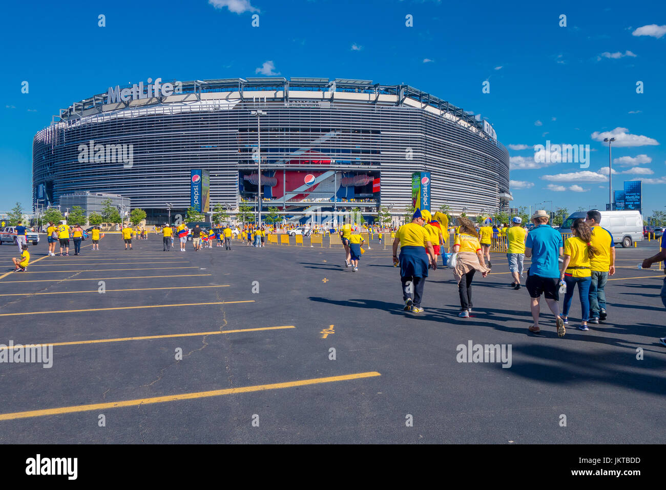 NEW YORK, USA - NOVEMBER 22, 2016: Unidentified ecuadorian fans walking to enter to Metlife Stadium to see the football game in New York Usa Stock Photo