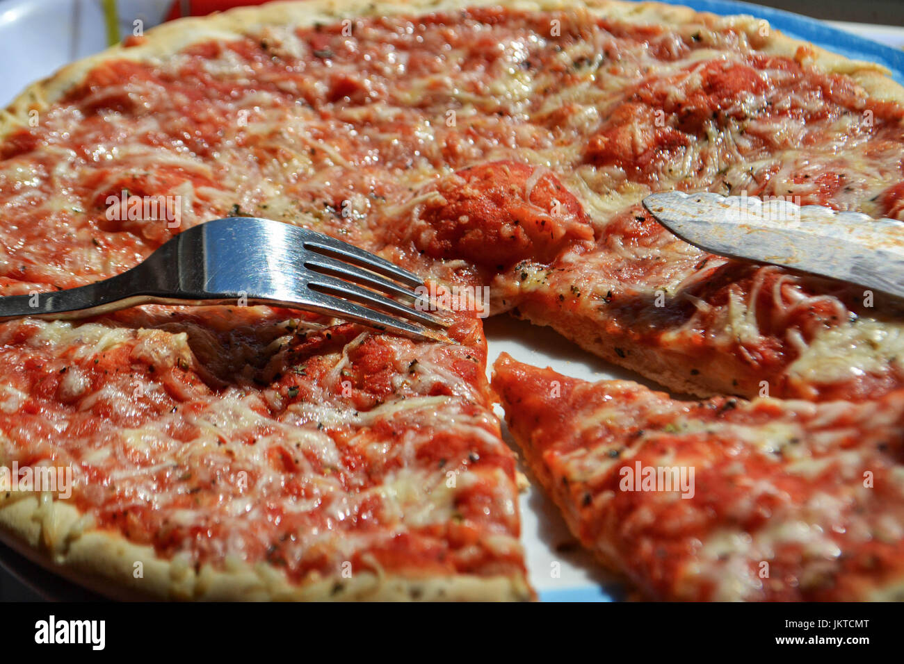 Pizza with knife hires stock photography and images Alamy