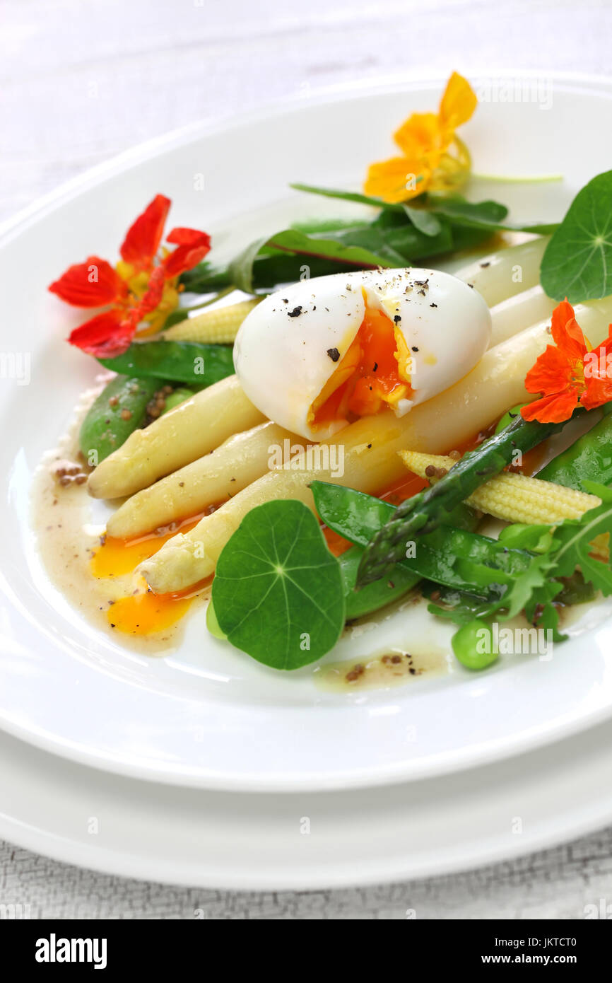 white asparagus warm salad with soft boiled egg and vegetables Stock