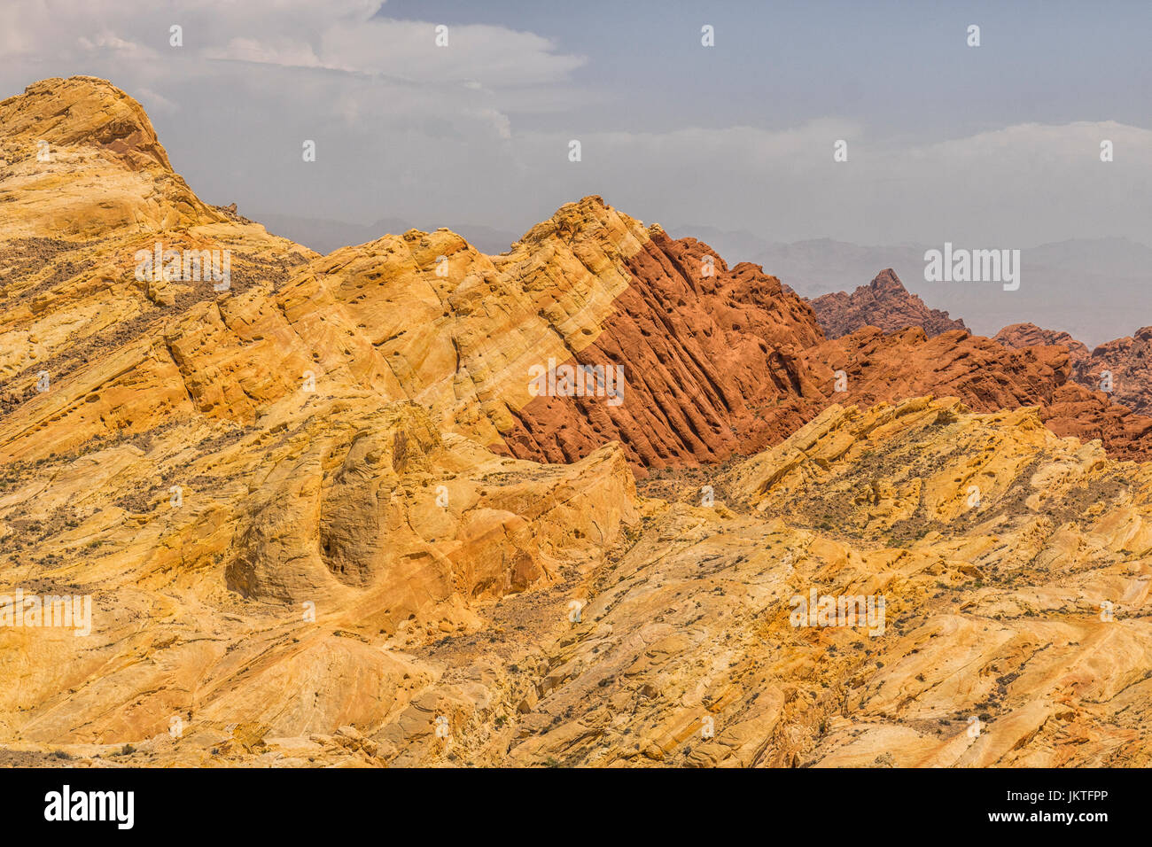 Valley of Fire State Park with 40,000 acres of bright red Aztec sandstone outcrops nestled in gray and tan limestone IV Stock Photo