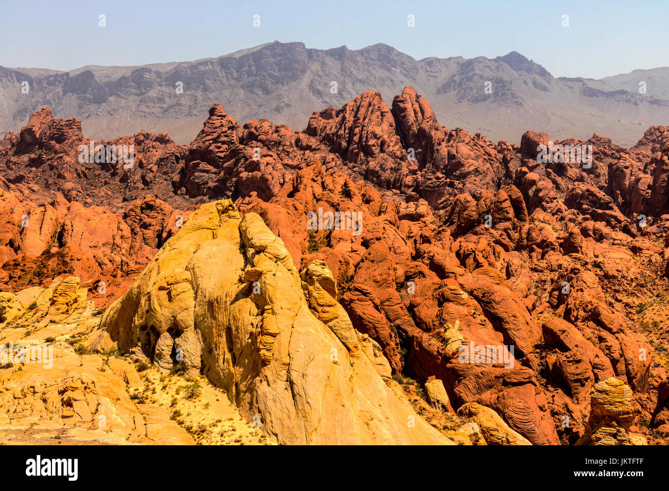 Valley of Fire State Park with 40,000 acres of bright red Aztec sandstone outcrops nestled in gray and tan limestone V Stock Photo