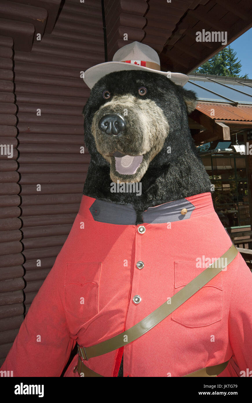 Stuffed bear with a Mountie uniform at Capilano Suspension Bridge Park, Vancouver, British Columbia, Canada Stock Photo