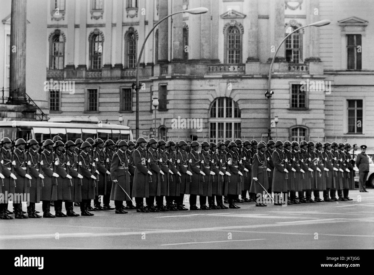 The NVA, National People’s Army of the German democratic Republic, Deutsche Demokratische Republik, changing of the guard ceremony in  Berlin by the Friedrich Engels Guard Regiment. It was the NVA's last official Great Wachaufzug or Neue Wache on Berlin’s Unter den Linden boulevard,  November 15th1989, just six days after the fall of the Berlin wall on November 9th. The GDR ended three weeks later. Divided Cities. Stock Photo
