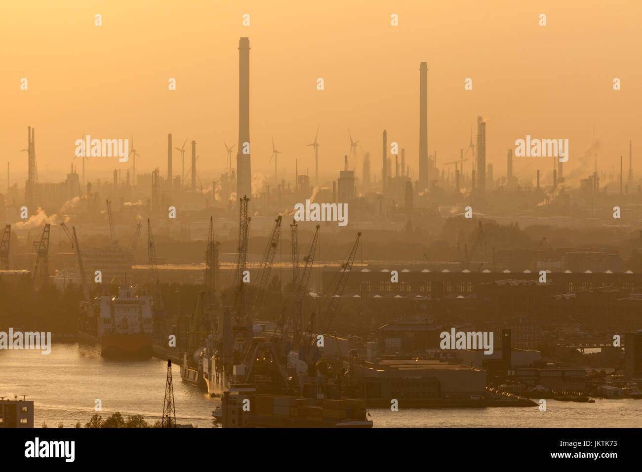 Port of Rotterdam at sunset. Rotterdam, South Holland, Netherlands. Stock Photo