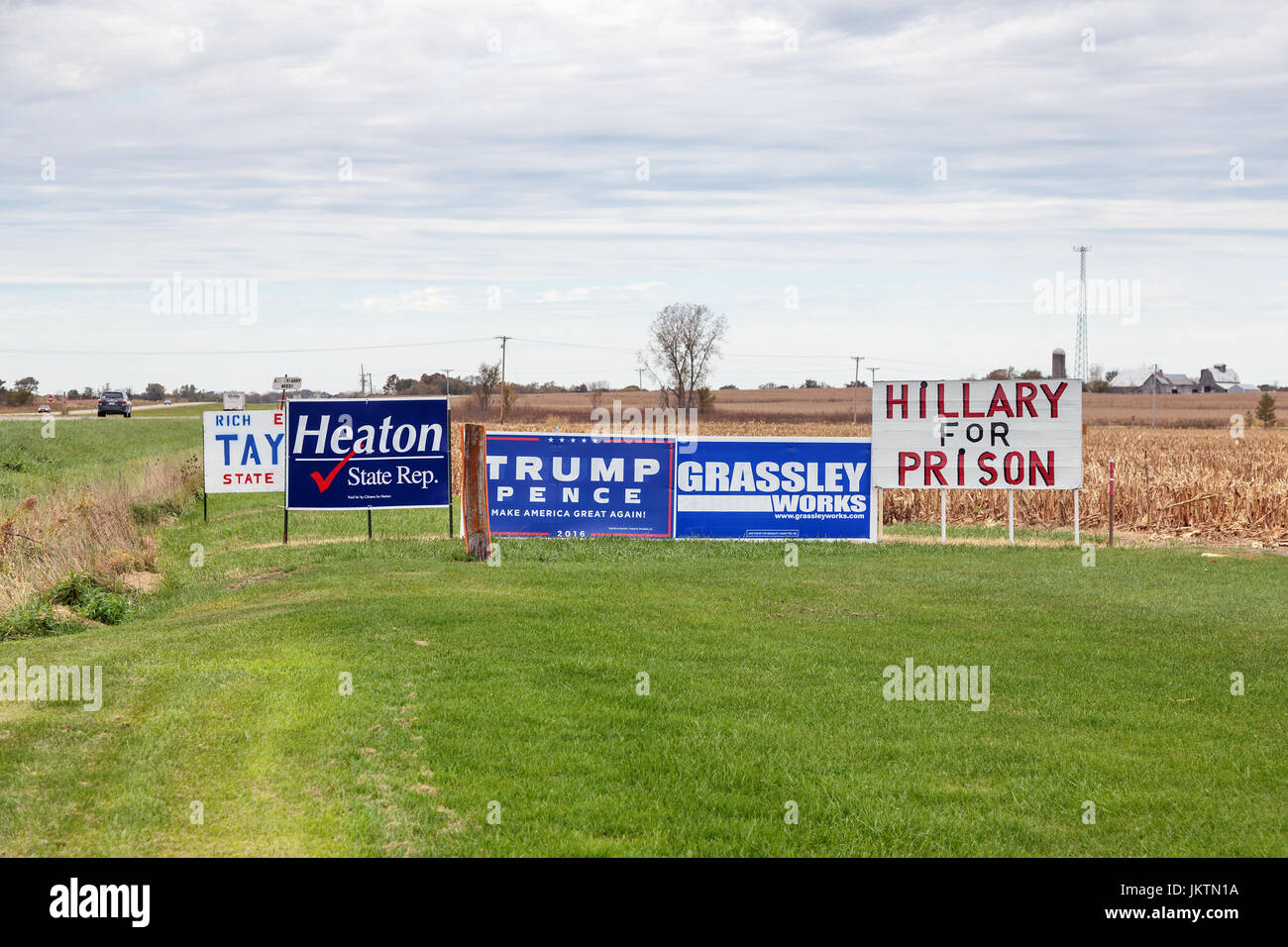 "Hillary For Prison" and Republican campaign signs along US Route 34